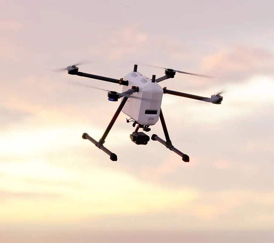 Professional hexacopter drone with gimbal camera in flight